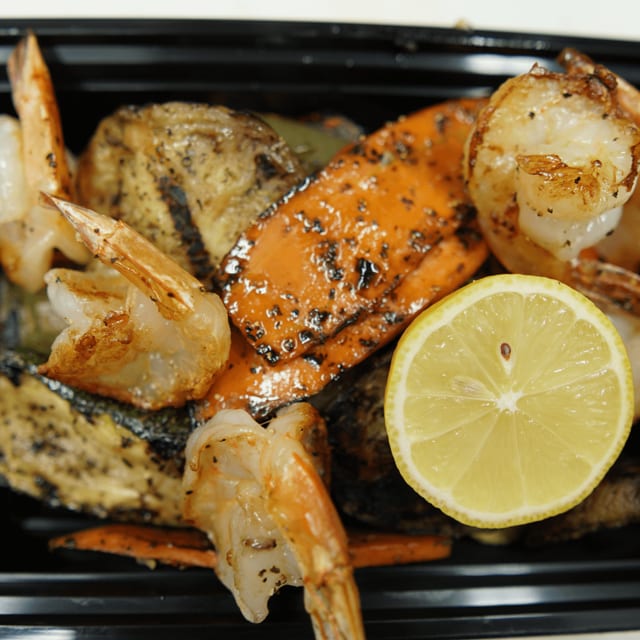 Grilled Shrimp Over Grilled Vegetables.