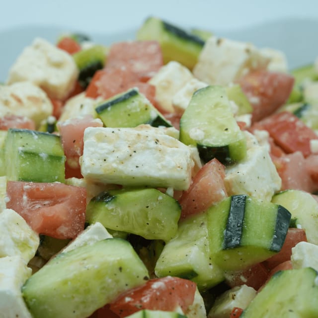 Greek Tomato Cucumber Onion Feta Salad.